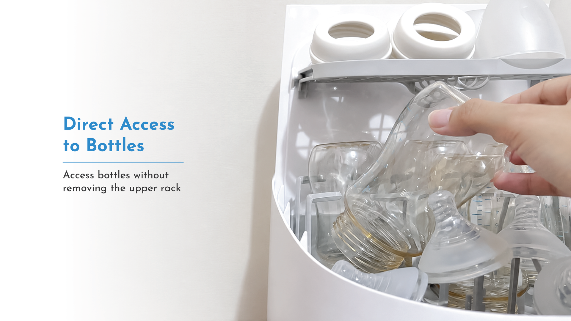 Hand reaching baby bottles directly without removing upper rack in Pristine washer