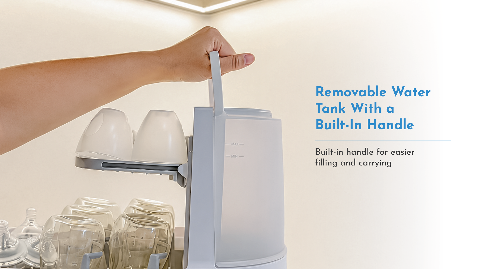 Removable water tank with built-in handle on Lollababy Pristine bottle washer