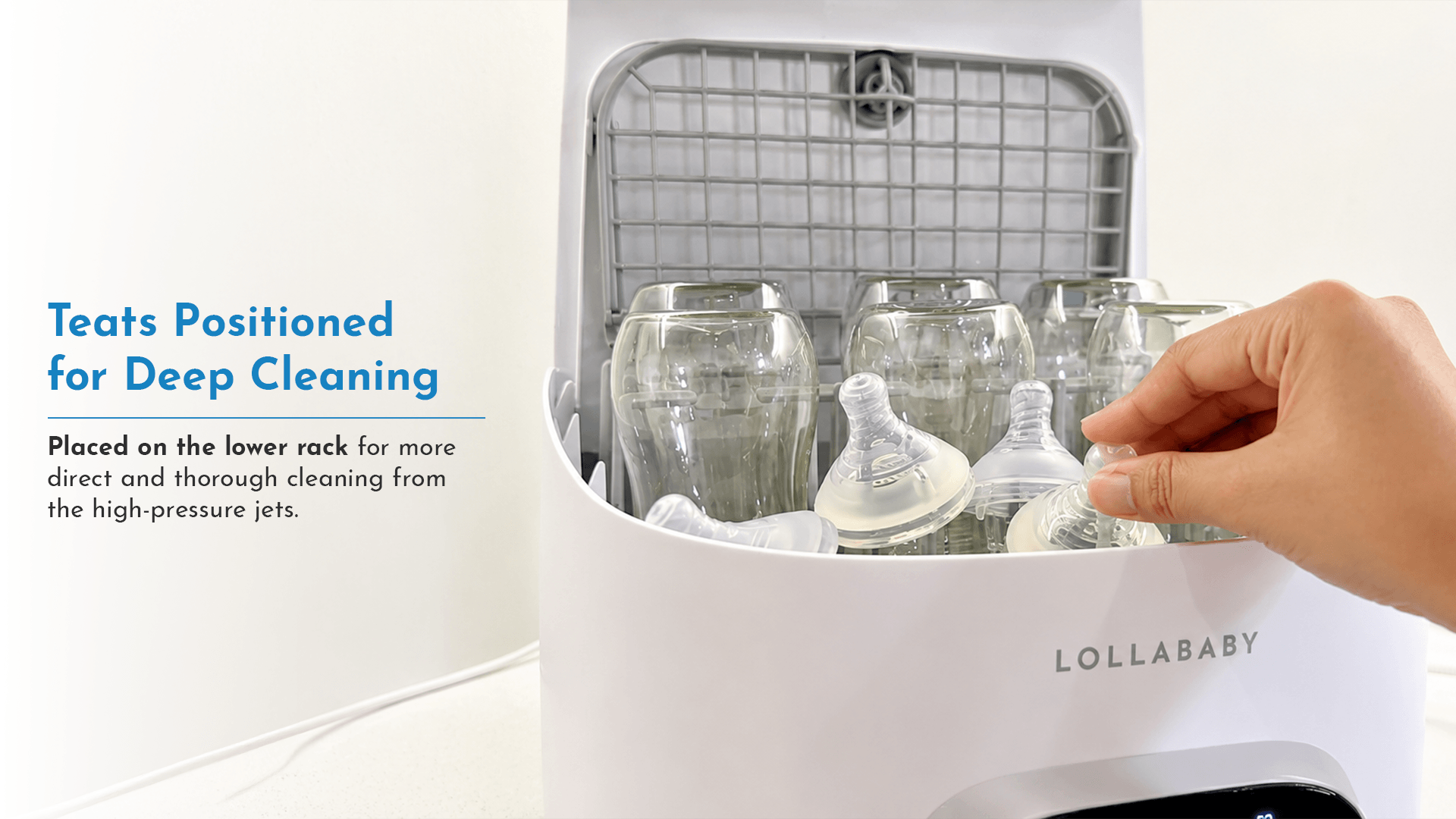 Baby bottle teats placed on lower rack of Pristine bottle washer for deep cleaning